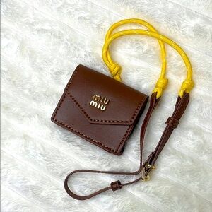 Miu Miu style Leather, cord, and metal trick with mini-pouch